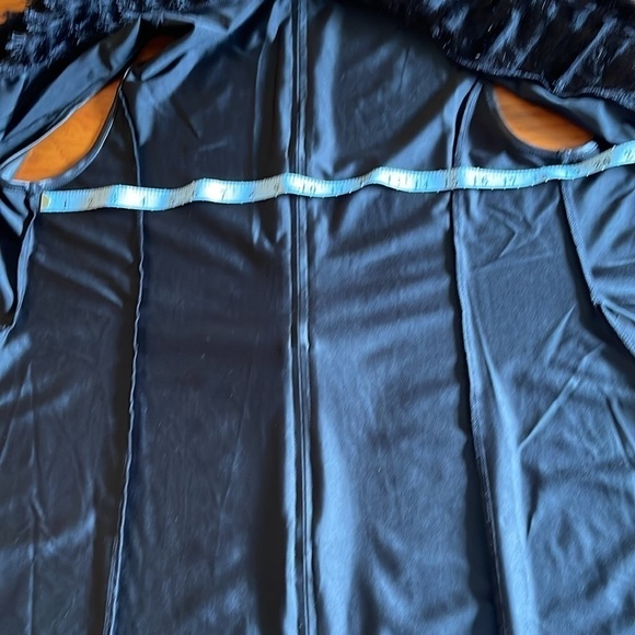 Small/medium but fits larger. Fabulous zipper detail and fringe. - Picture 7 of 9